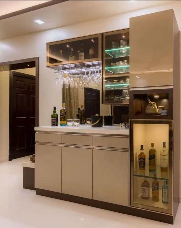 Bar cabinet with glass display shelves, stemware storage and a lit bottle niche