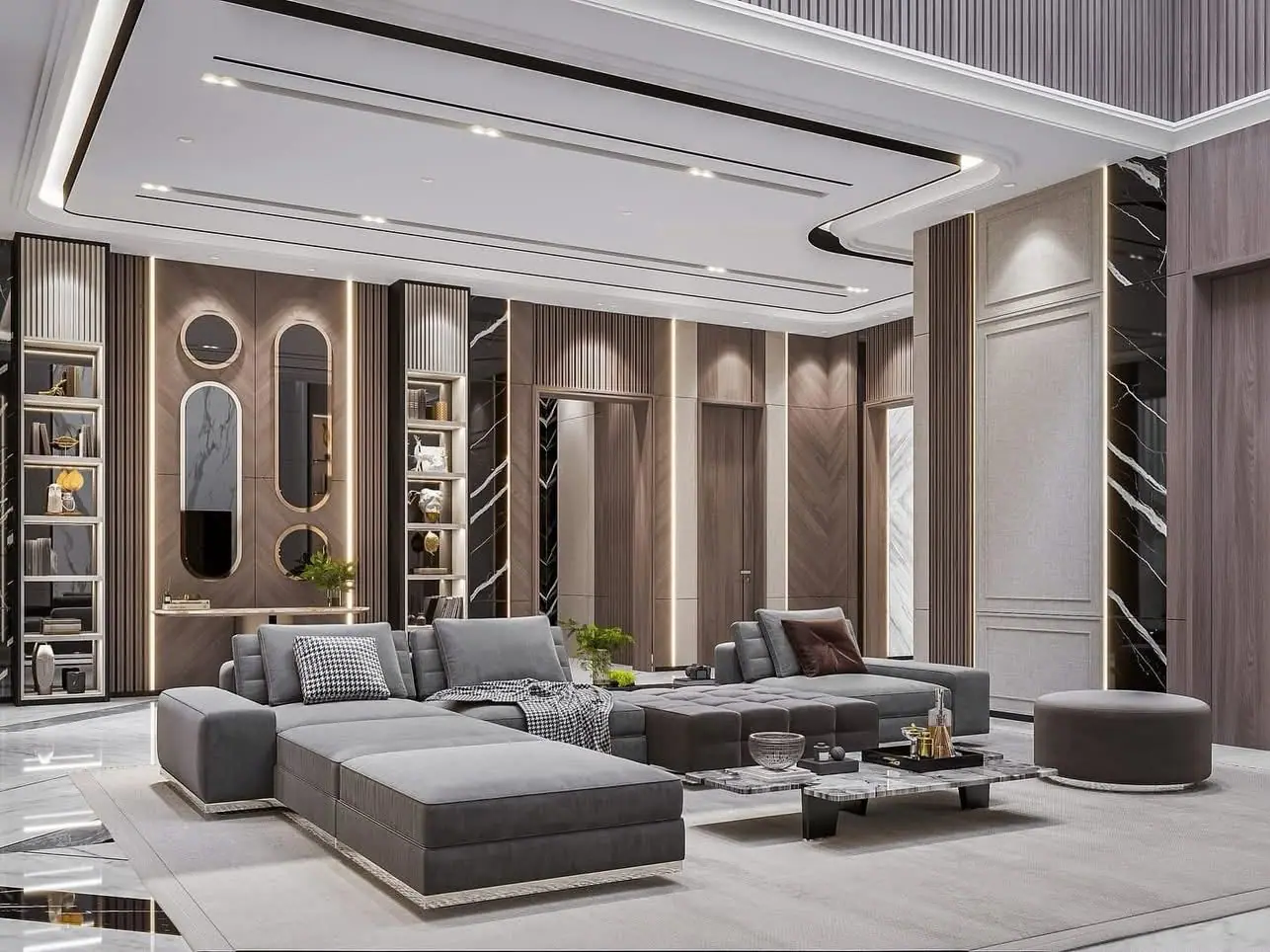 Living room design with a grey sectional, niche shelving and a curved ceiling detail